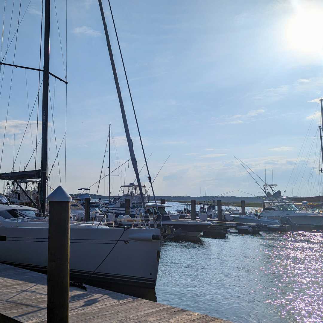 Luxury yachts and sailboats docked at Bohicket Marina, the premier deep-water gateway for Kiawah Island residents.